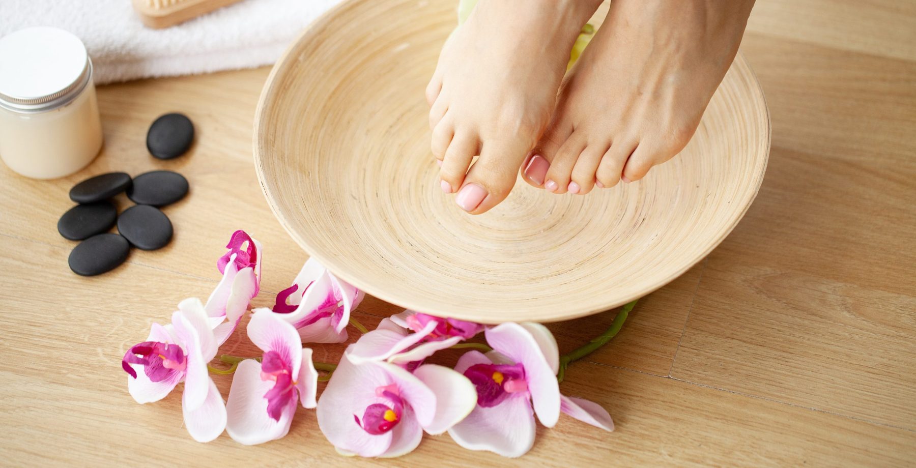 Closeup Photo of a Female Feet at Spa Salon on Pedicure Procedure